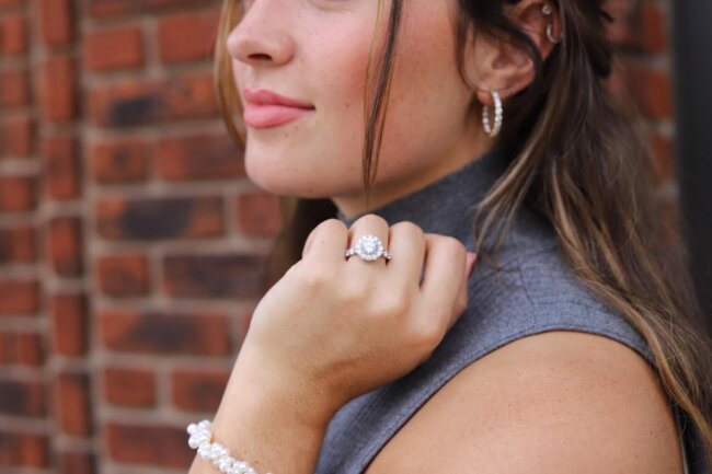 Woman showing engagement ring